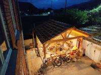 an overhead view of a pavilion with bikes parked on a patio at AMBROsador in Ambrolauri