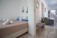 Postel nebo postele na pokoji v ubytování Babilia central appartment suites Limenas Hersonisou