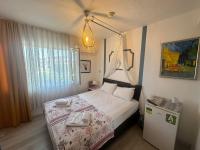 Postel nebo postele na pokoji v ubytování Bonjourla Otel