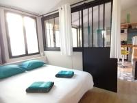 Łóżko lub łóżka w pokoju w obiekcie Les Callunes chambres d'hôtes et gîte pour 2 Bassin d'Arcachon
