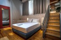 Posteľ alebo postele v izbe v ubytovaní Belle Athenes - Luxury Rooms at Monastiraki Railway Station