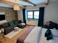 Postel nebo postele na pokoji v ubytování APARTMÁNY 91 Boží Dar