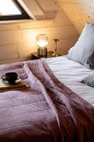 Posteľ alebo postele v izbe v ubytovaní Furmanova Chalets