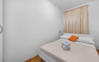 Posteľ alebo postele v izbe v ubytovaní Four-Bedroom Holiday Home In Slivno
