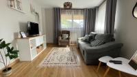 Televízia a/alebo spoločenská miestnosť v ubytovaní Apartamento Villa de Cartes