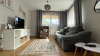 Televízia a/alebo spoločenská miestnosť v ubytovaní Apartamento Villa de Cartes
