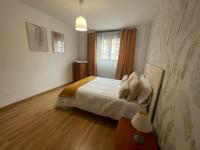 Posteľ alebo postele v izbe v ubytovaní Apartamento Villa de Cartes