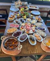 a table full of different types of food at Muse Cappadocia in Uchisar