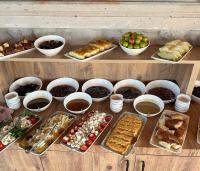a table topped with lots of different types of food at Muse Cappadocia in Uchisar