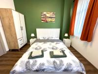 Postel nebo postele na pokoji v ubytování Yellowhouse Room 2