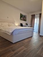 Posteľ alebo postele v izbe v ubytovaní Guest House Mačić