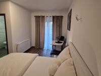 Posteľ alebo postele v izbe v ubytovaní Guest House Mačić