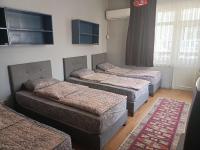 Postel nebo postele na pokoji v ubytování Zafer Hostel