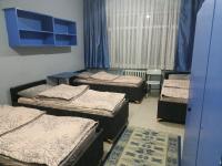 Postel nebo postele na pokoji v ubytování Zafer Hostel
