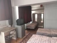 Postel nebo postele na pokoji v ubytování Zafer Hostel