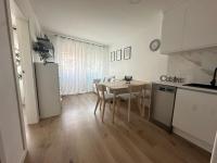 Kuchyňa alebo kuchynka v ubytovaní Beach apartment IV Coeur de Plage