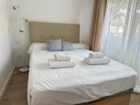 Posteľ alebo postele v izbe v ubytovaní Beach apartment IV Coeur de Plage