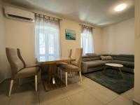 Posedenie v ubytovaní Apartment in a small village near the beach