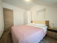Posteľ alebo postele v izbe v ubytovaní Apartment in a small village near the beach