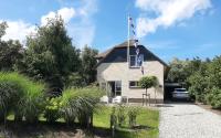 Zahrada ubytování Beach Villa Makkum met sauna