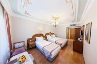 Postel nebo postele na pokoji v ubytování Seven Hills Hotel - Special Category