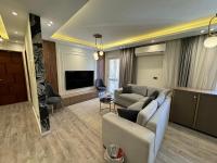 TV a/nebo společenská místnost v ubytování Ultra modern & cozy 2BD apartment