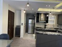 Kuchyň nebo kuchyňský kout v ubytování Ultra modern & cozy 2BD apartment