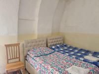 Postel nebo postele na pokoji v ubytování Gün Işığı Pansiyon