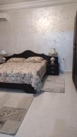 Postel nebo postele na pokoji v ubytování Guest house DAR Al YASMINA