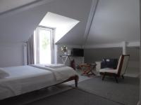 Postel nebo postele na pokoji v ubytování Cozy Independent Room