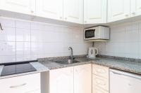 A kitchen or kitchenette at Costamar Oceanview By Dream Homes Tenerife