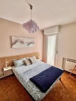 Posteľ alebo postele v izbe v ubytovaní Casa vista Saint Vincent accanto alle Terme