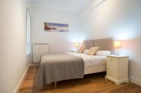 Posteľ alebo postele v izbe v ubytovaní Playa Gros - IB. Apartments