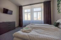 Postel nebo postele na pokoji v ubytování Hotel THT