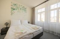Postel nebo postele na pokoji v ubytování Hotel THT