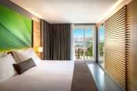 Postel nebo postele na pokoji v ubytování San Marino Resort