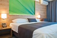 Postel nebo postele na pokoji v ubytování San Marino Resort