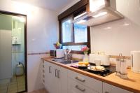 Kuchyňa alebo kuchynka v ubytovaní Apartamentos Turísticos Duque de Hornachuelos