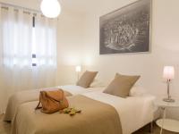 Posteľ alebo postele v izbe v ubytovaní Apartamentos Turísticos Duque de Hornachuelos