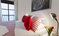Posteľ alebo postele v izbe v ubytovaní Apartamentos Turísticos Duque de Hornachuelos