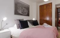 Posteľ alebo postele v izbe v ubytovaní Apartamentos Turísticos Duque de Hornachuelos