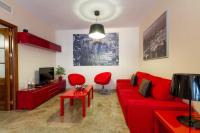 Televízia a/alebo spoločenská miestnosť v ubytovaní Apartamentos Turísticos Duque de Hornachuelos
