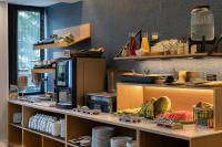 A kitchen or kitchenette at Hotel Universal