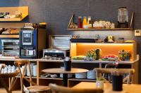 A kitchen or kitchenette at Hotel Universal