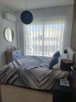Postel nebo postele na pokoji v ubytování Villa Günther Palm Village