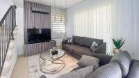 TV a/nebo společenská místnost v ubytování Villa Günther Palm Village