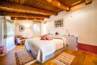Posteľ alebo postele v izbe v ubytovaní Castello Di Postignano Relais