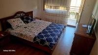 Postel nebo postele na pokoji v ubytování Jani apartment