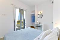 Posteľ alebo postele v izbe v ubytovaní Alexander Suites