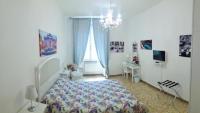 A bed or beds in a room at CiaoRoma!